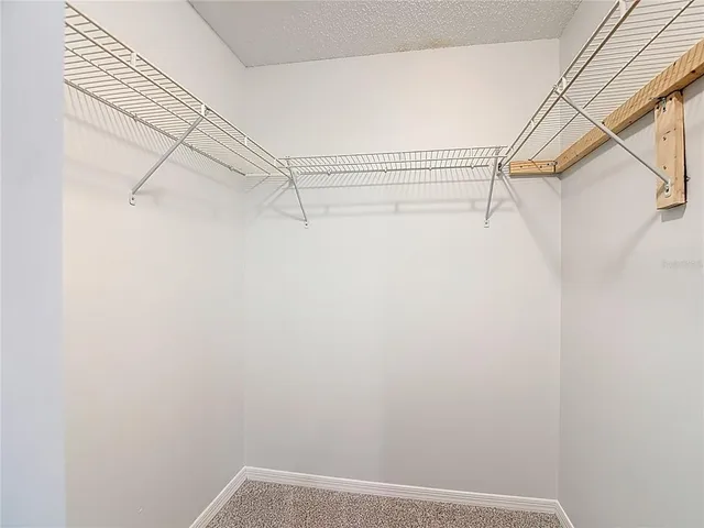 a view of a room with racks on the wall