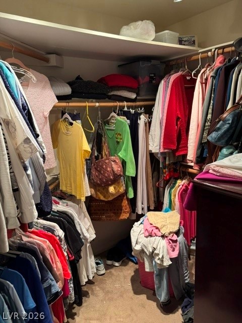 589 Beacon Ridge Way Mesquite, NV 89027 - Photo 15 of 18 Ample hanging space and shelving offer versatile storage solutions for any wardrobe.