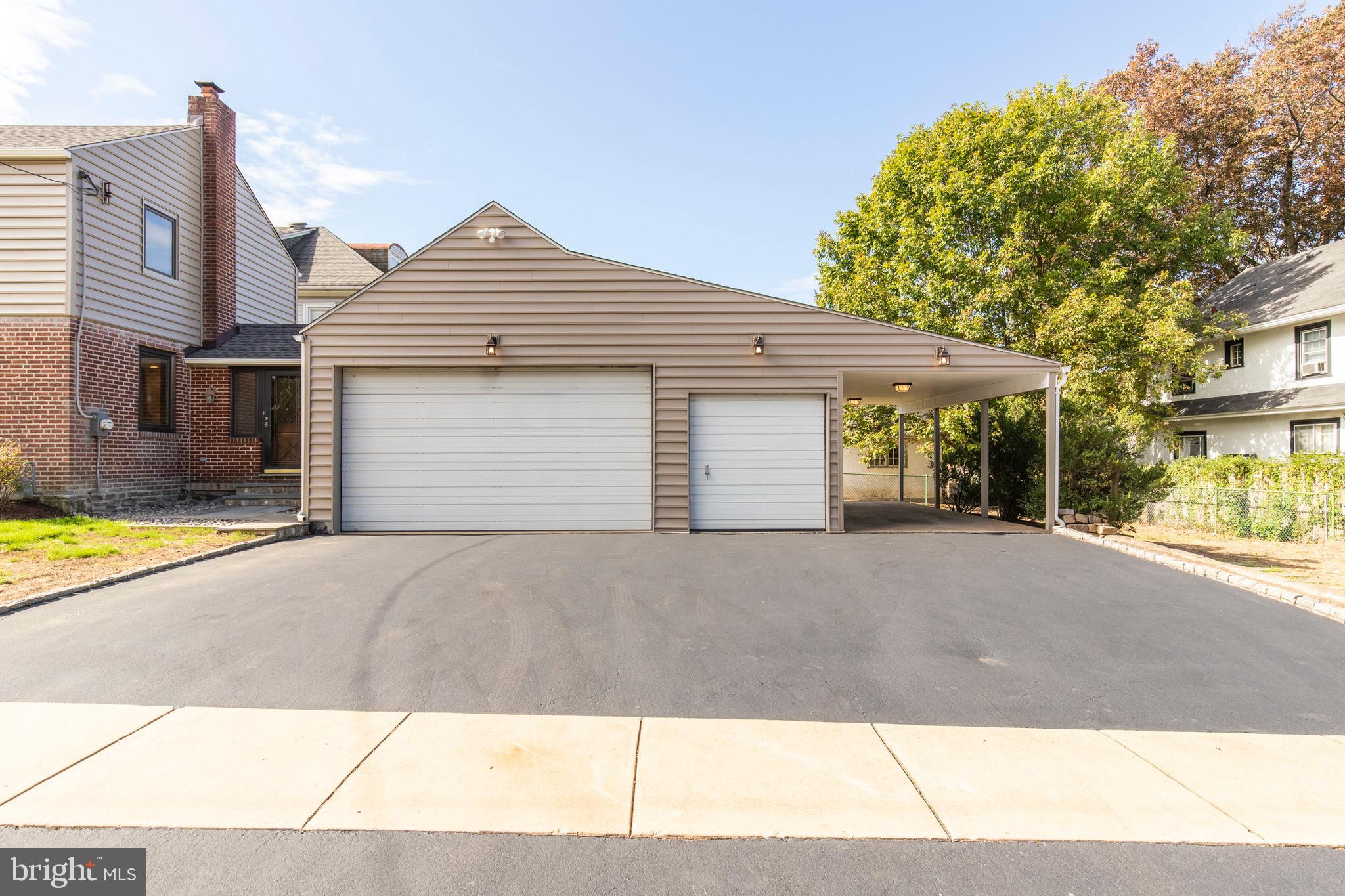 136 East Eagle Road Havertown, PA 19083 - Photo 4 of 37 Oversized Three Car Garage with Attic plus Carport