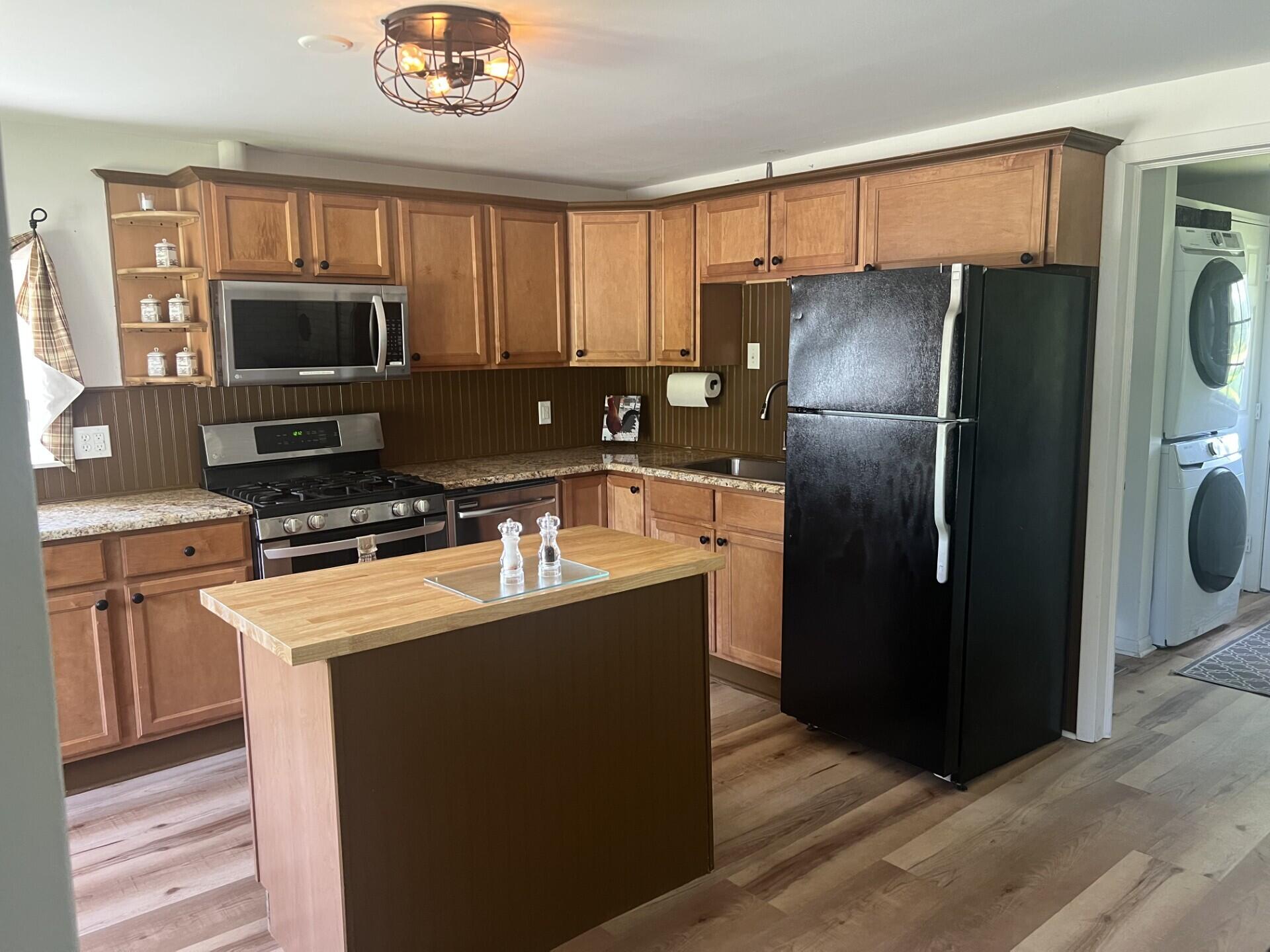 1233 Cumberland Head Road Plattsburgh, NY 12901 - Photo 5 of 24 kitchen island from front door