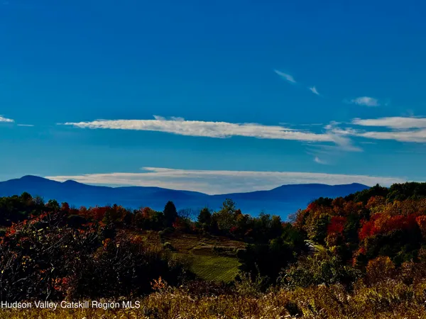 a view of a lake and a mountain