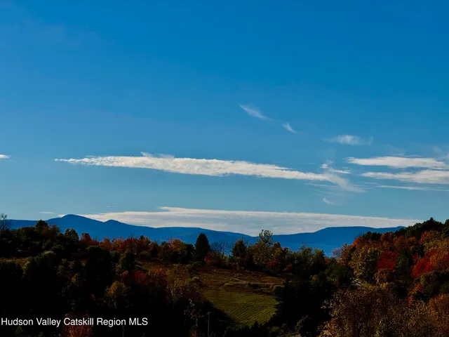 a view of sunset and city