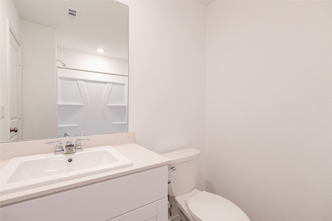 2509 Willkomen Way Pflugerville, TX 78660 - Photo 14 of 20 Bathroom with a shower and vanity