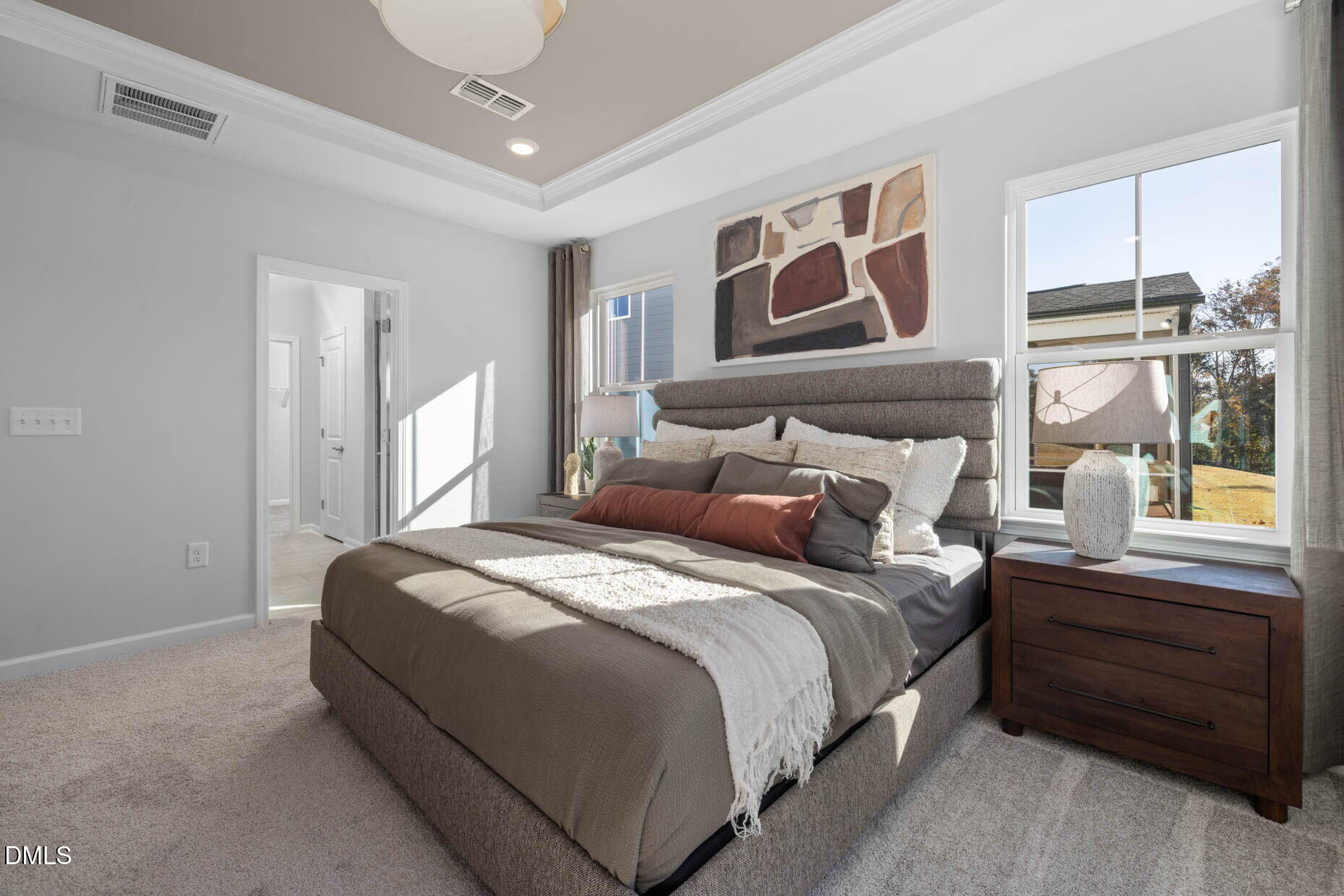 364 Broomside Avenue Raleigh, NC 27603 - Photo 14 of 35 a bedroom with a large bed and a window