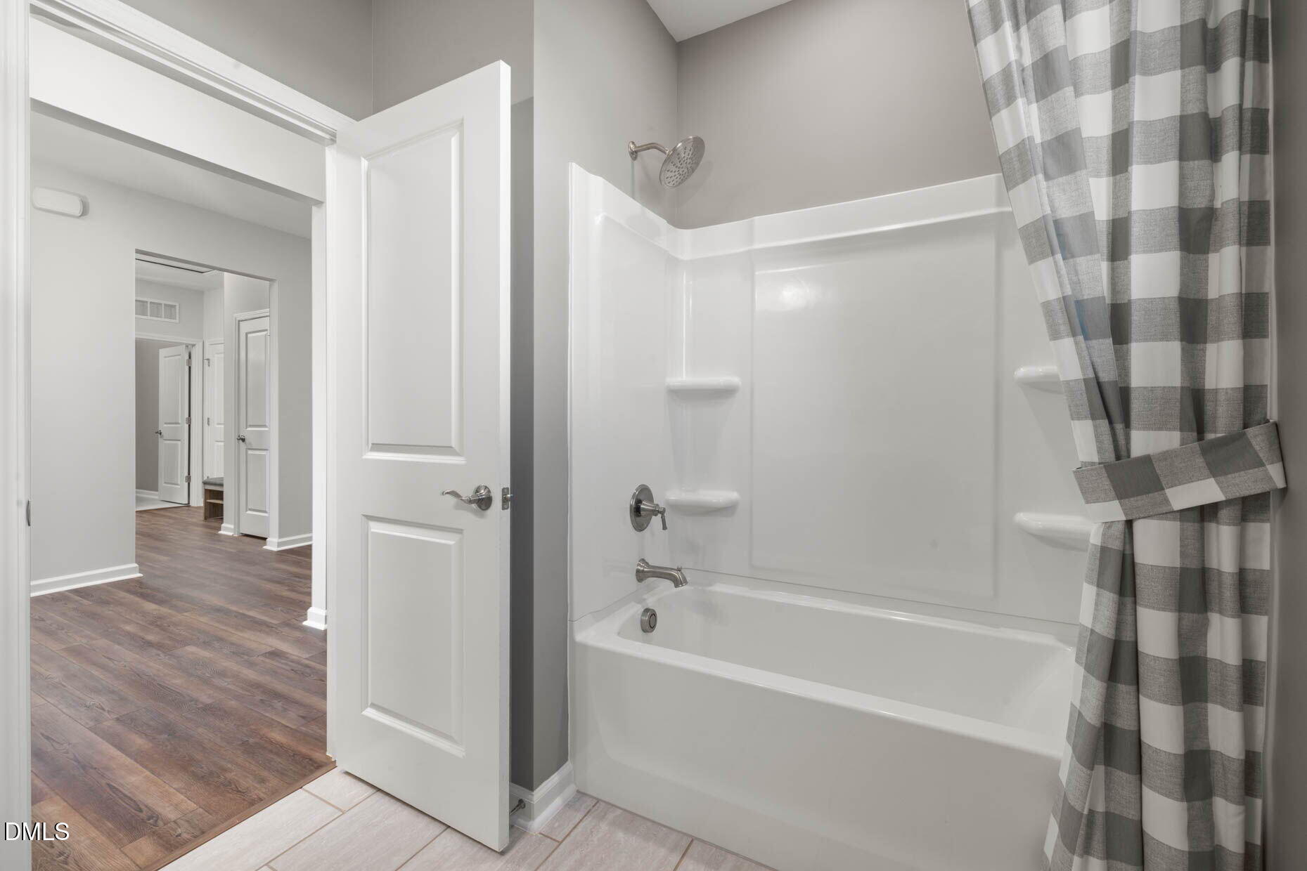 364 Broomside Avenue Raleigh, NC 27603 - Photo 21 of 35 a bathroom with a bathtub and a shower