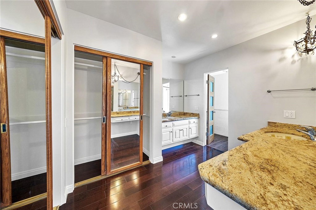 416 Meadowview Drive La Canada Flintridge, CA 91011 - Photo 19 of 35 a kitchen with a refrigerator and wooden floor