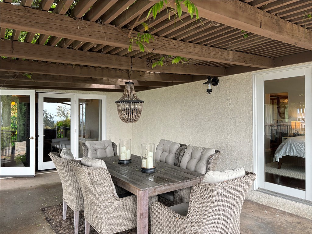 416 Meadowview Drive La Canada Flintridge, CA 91011 - Photo 22 of 35 a living room with furniture and a table