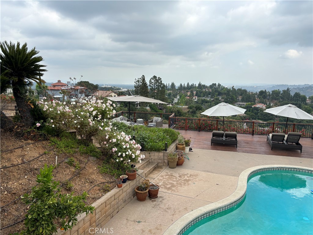 416 Meadowview Drive La Canada Flintridge, CA 91011 - Photo 30 of 35 a view of a terrace with sitting area