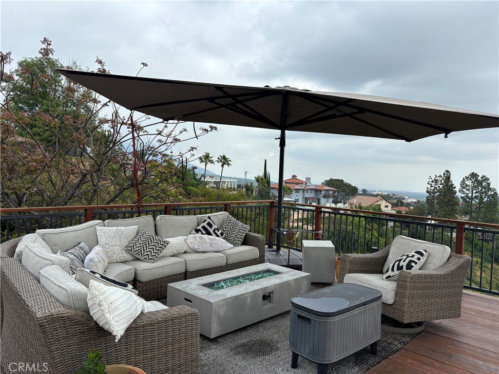 416 Meadowview Drive La Canada Flintridge, CA 91011 - Photo 31 of 35 a roof deck with couches and potted plants