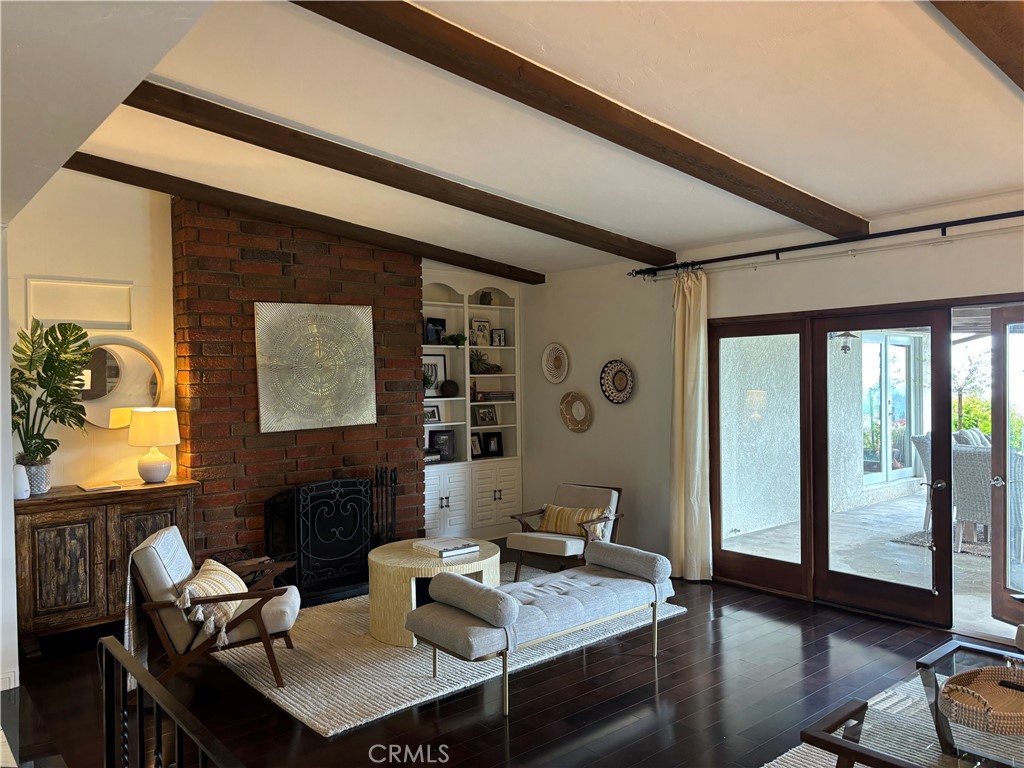 416 Meadowview Drive La Canada Flintridge, CA 91011 - Photo 6 of 35 a living room with furniture and a large window