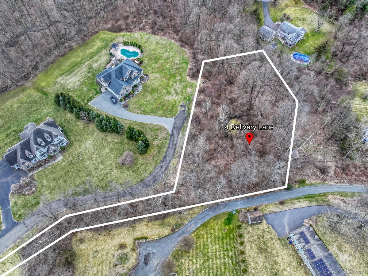 2 Delivery Lane New Milford, CT 06776 - Photo 1 of 1 a view of a swimming pool with a yard
