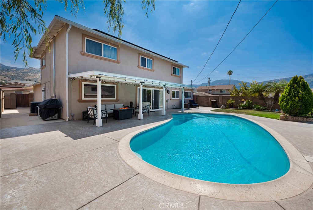 2203 Homewood Avenue Simi Valley, CA 93063 - Photo 35 of 37 a view of a house with a swimming pool