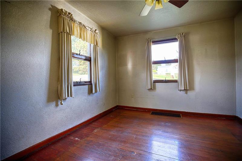 13420 Ridge Road North Huntingdon, PA 15642 - Photo 11 of 17 Main level master bedroom with hardwood floors.