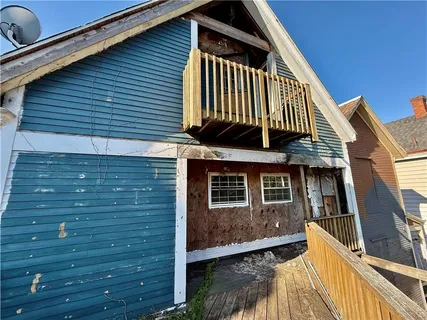 a view of a house with a deck