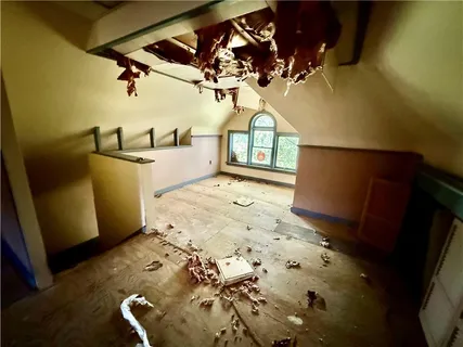 a view of a living room and bathroom