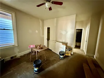 a view of an empty room and window