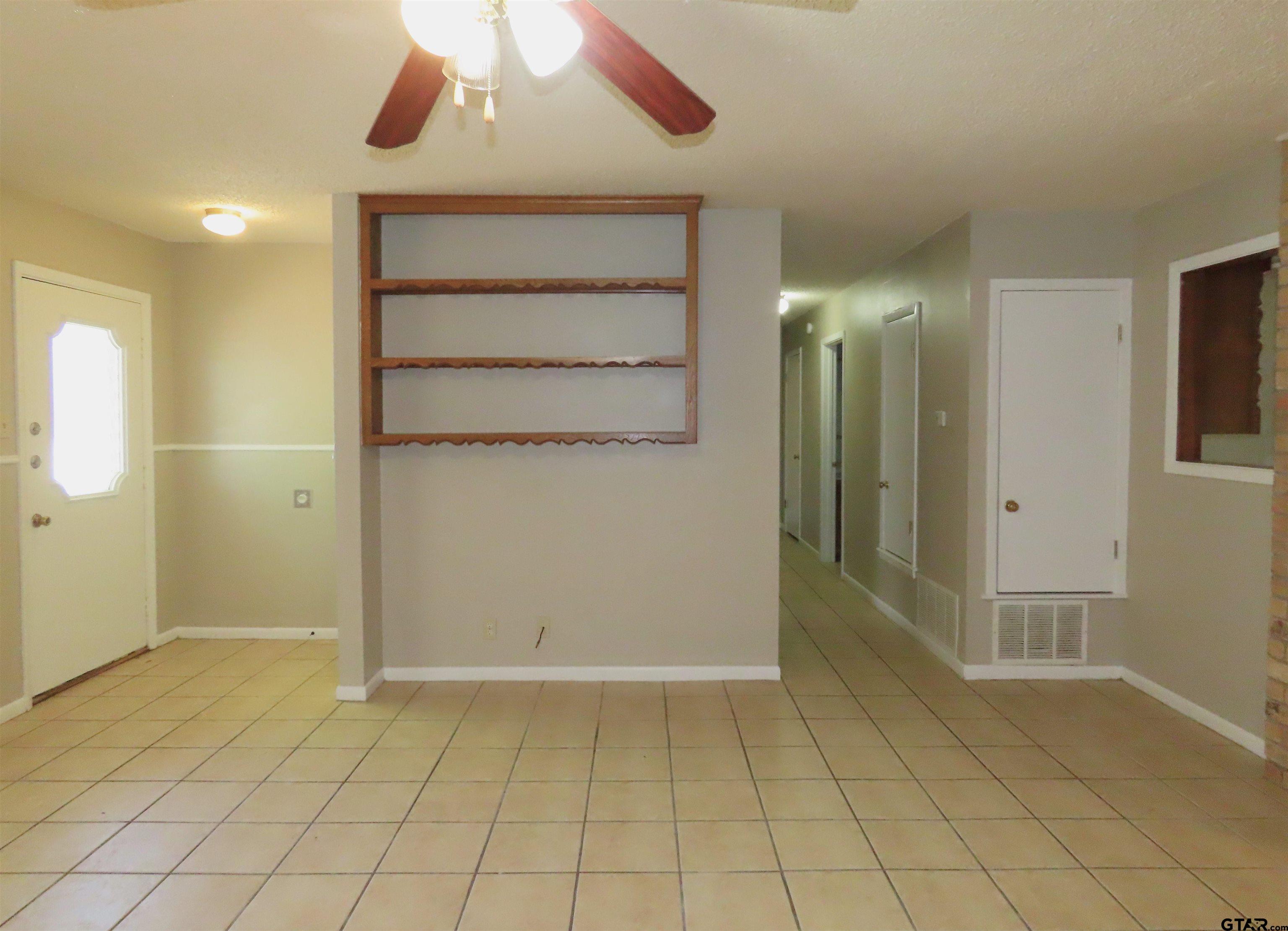 402 Muller Garden Road Tyler, TX 75703 - Photo 5 of 33 an empty room with a space