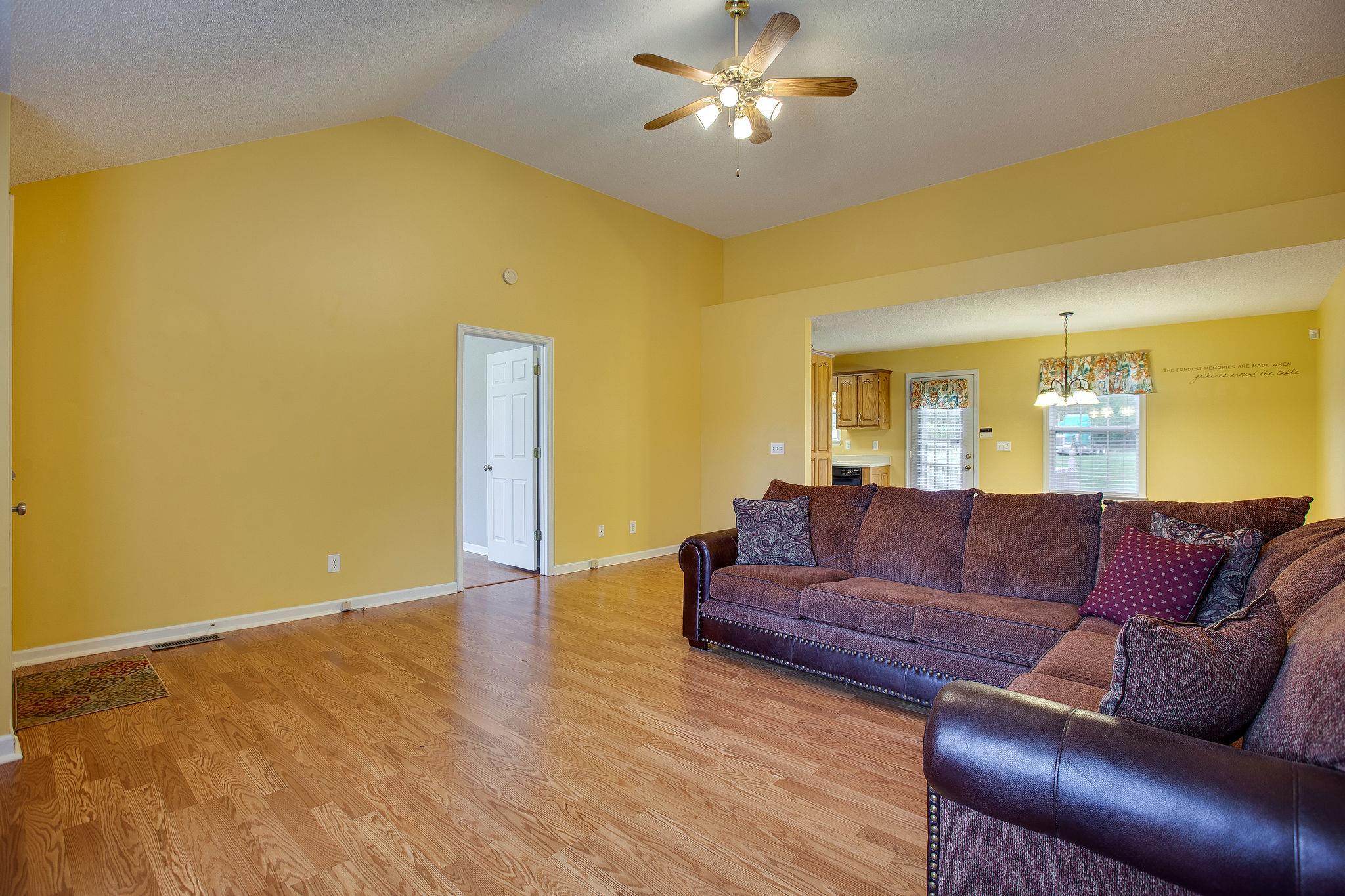 1989 Lasea Road Spring Hill, TN 37174 - Photo 3 of 17 This room is large and open, perfect for entertaining!