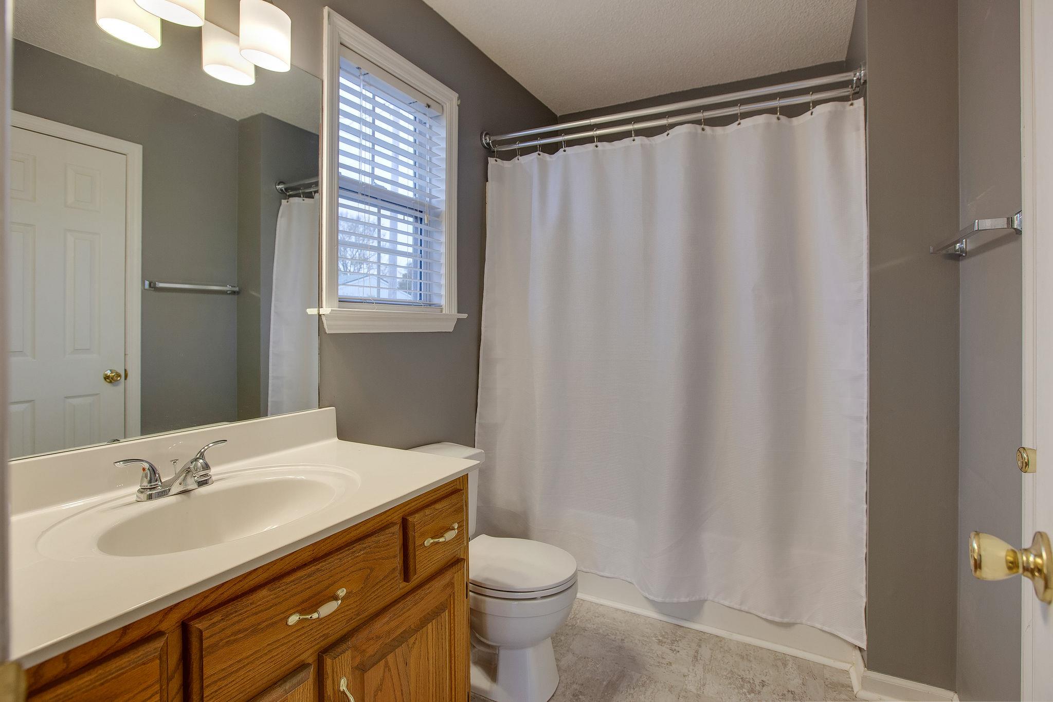 1989 Lasea Road Spring Hill, TN 37174 - Photo 10 of 17 The Master bath is private and has a extra large walk-in closet to the right-hand side!