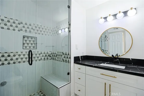 a view of a livingroom with a flat screen tv