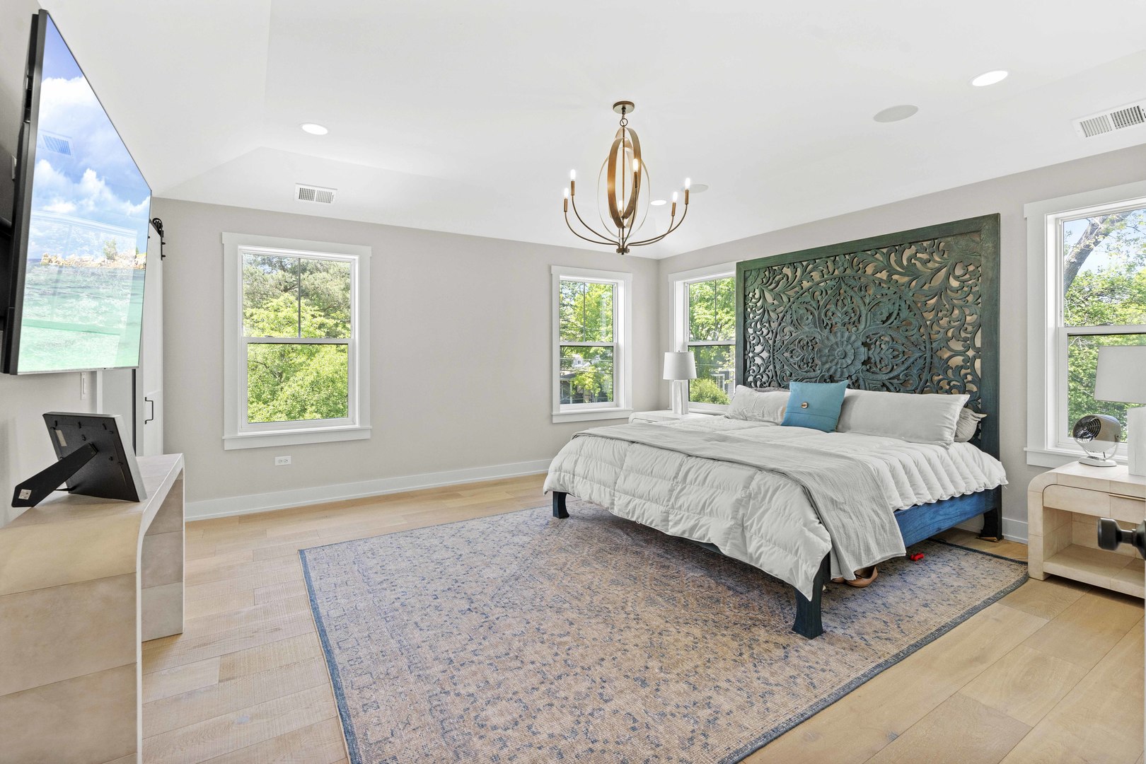 1318 Kenton Road Deerfield, IL 60015 - Photo 25 of 56 a bedroom with a bed chandelier and window