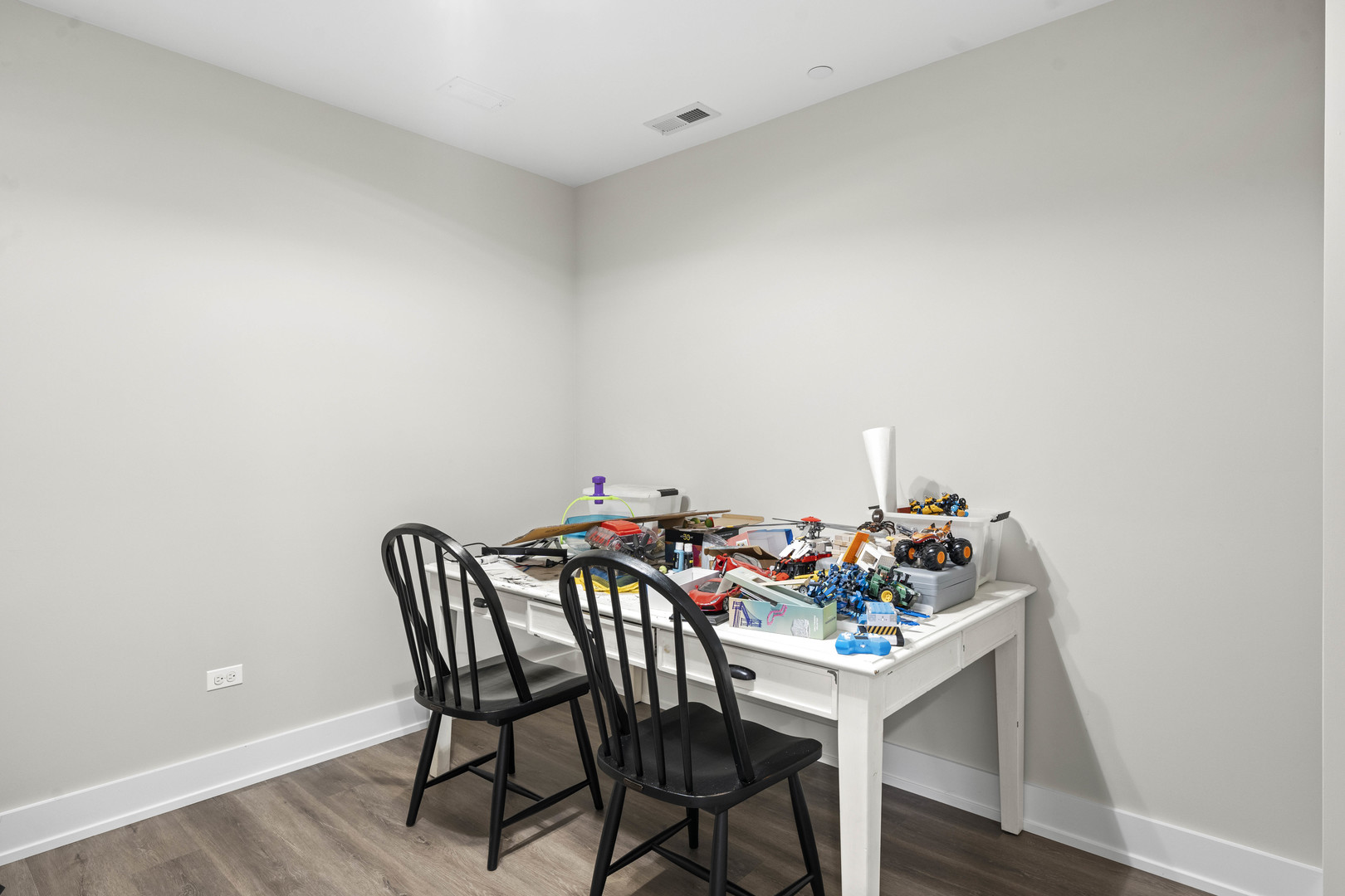 1318 Kenton Road Deerfield, IL 60015 - Photo 45 of 56 a view of a dining room with furniture and wooden floor
