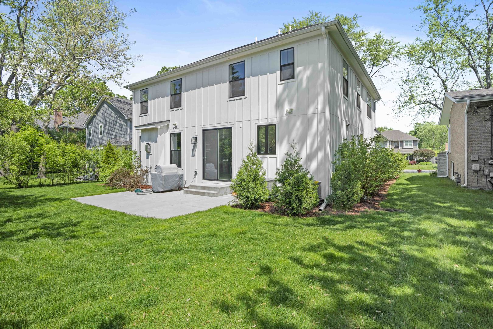 1318 Kenton Road Deerfield, IL 60015 - Photo 46 of 56 a front view of a house with a yard