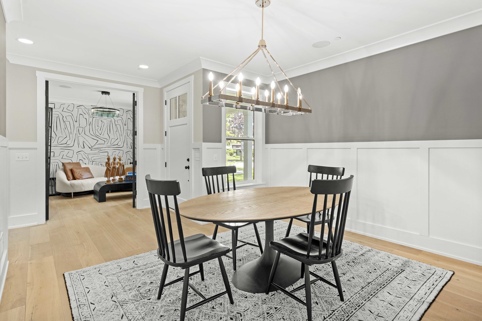 1318 Kenton Road Deerfield, IL 60015 - Photo 7 of 56 a view of a dining room with furniture and chandelier