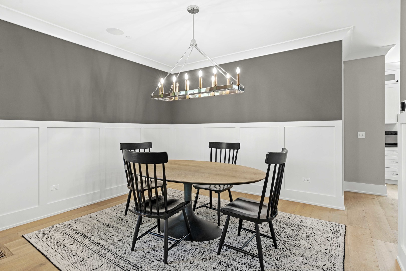 1318 Kenton Road Deerfield, IL 60015 - Photo 8 of 56 a view of a dining room with furniture and wooden floor