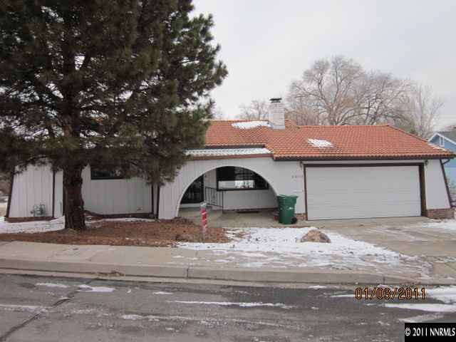 2090 Keystone Avenue Reno, NV 89503 - Photo 1 of 10 a front view of a house with a yard