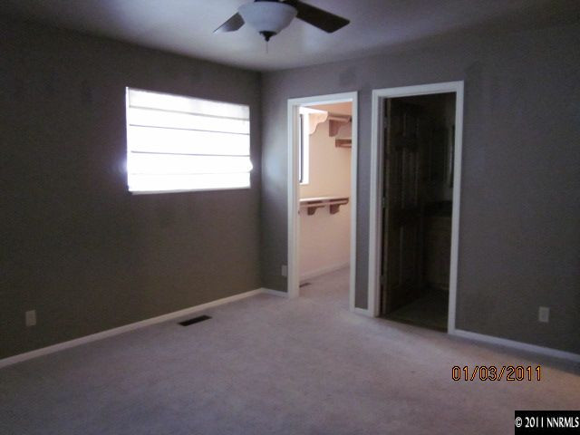 2090 Keystone Avenue Reno, NV 89503 - Photo 6 of 10 an empty room with a empty space and windows