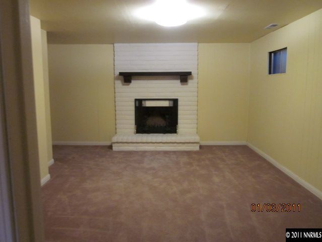 2090 Keystone Avenue Reno, NV 89503 - Photo 7 of 10 a view of empty room with a fireplace