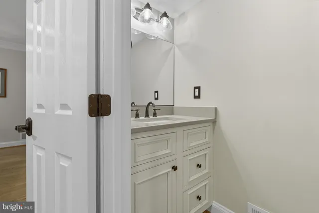 a kitchen with stainless steel appliances granite countertop wooden cabinets a sink and dishwasher