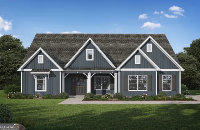 front view of a house with a yard