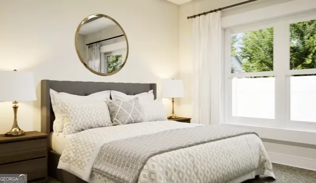 a bedroom with a bed and a mirror