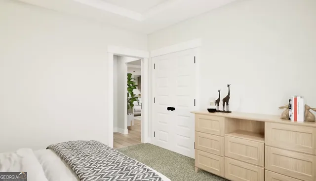 a bedroom with a bed and cabinets