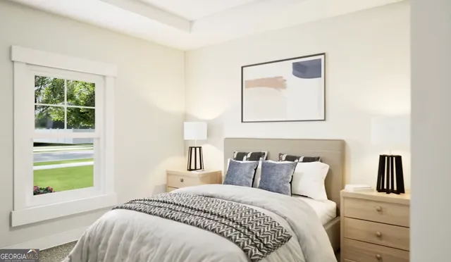 a bedroom with a bed and a window