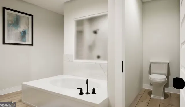 a bathroom with a sink and a toilet