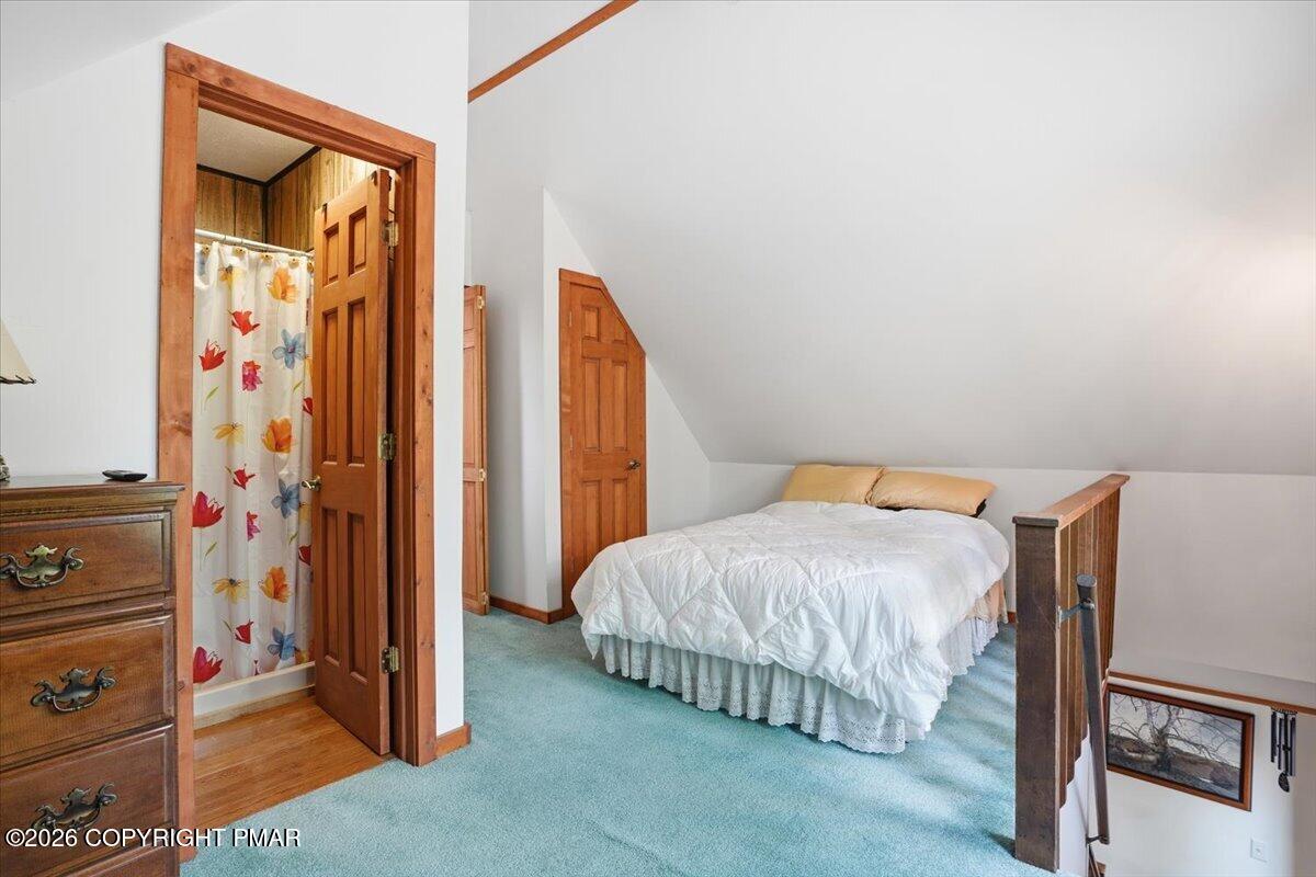 1517 Deer Run East Bushkill, PA 18324 - Photo 24 of 42 a bedroom with a bed and a window