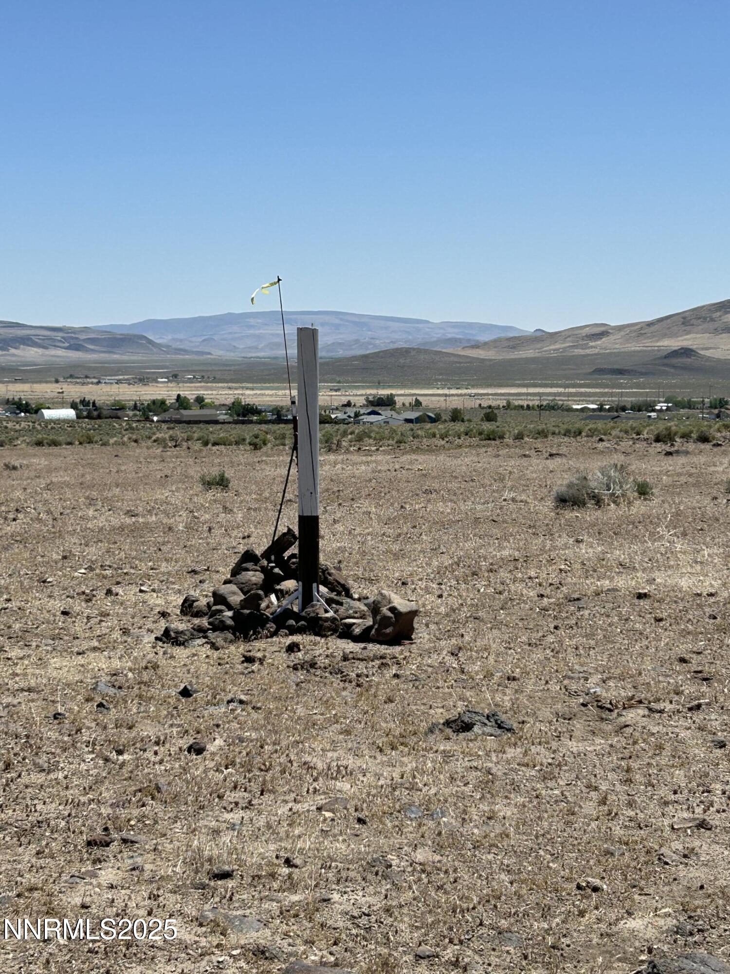13595 Seneca Road Stagecoach, NV 89429 - Photo 13 of 15 a view of a lake with a mountain