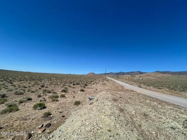 a view of mountain view with mountains in the background