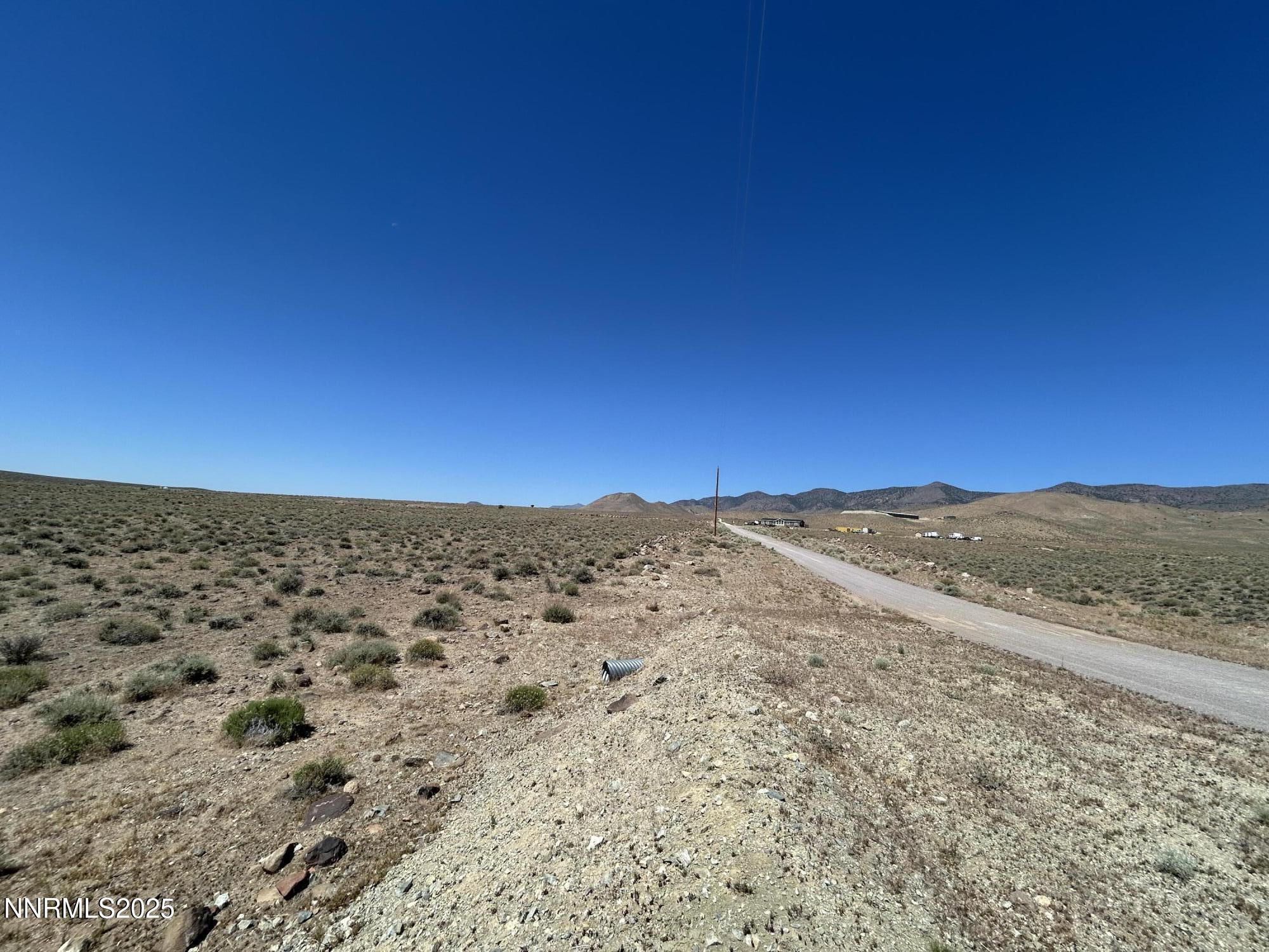 13595 Seneca Road Stagecoach, NV 89429 - Photo 3 of 15 a view of mountain view with mountains in the background