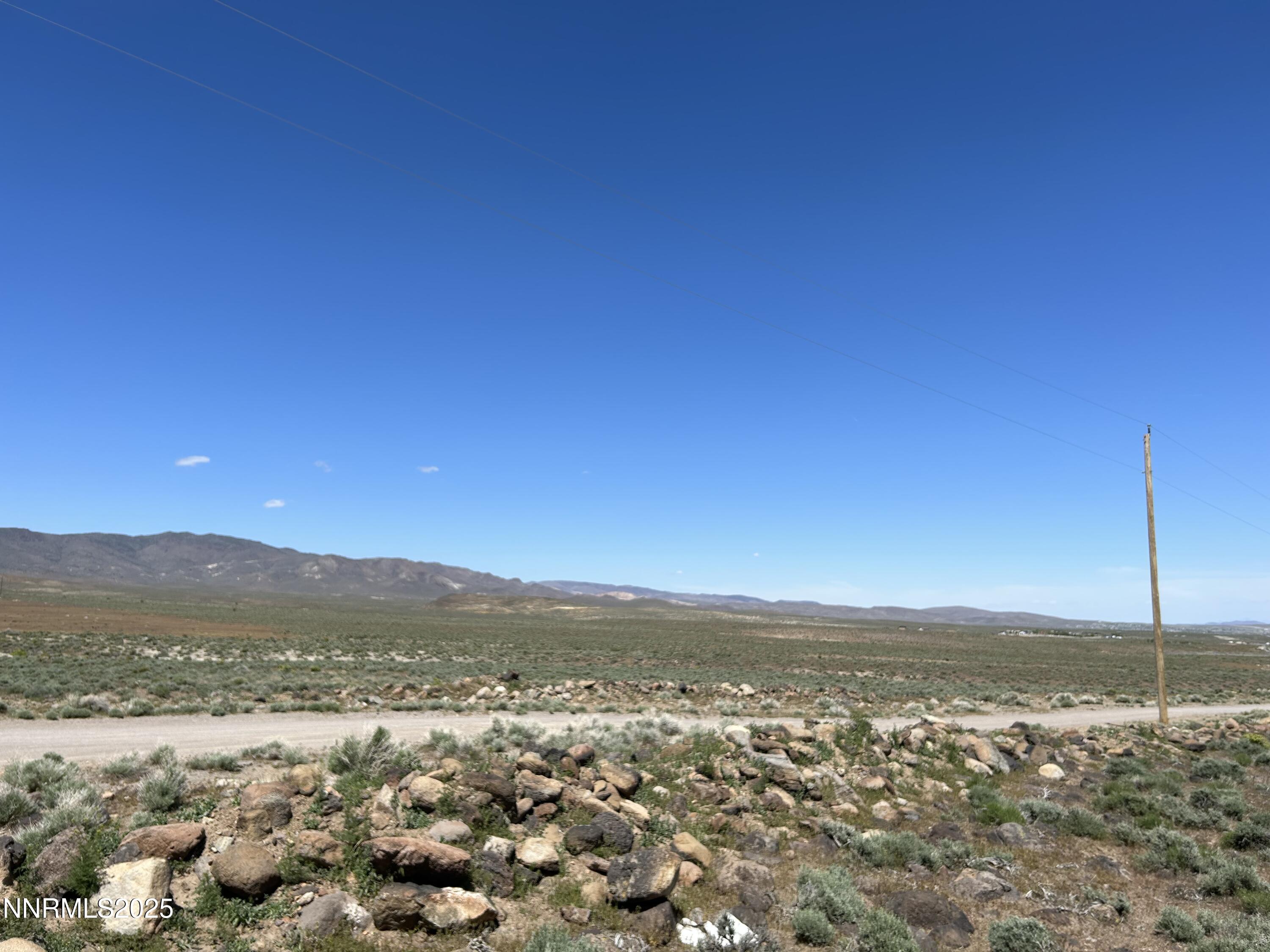 13595 Seneca Road Stagecoach, NV 89429 - Photo 6 of 15 a view of city and mountain