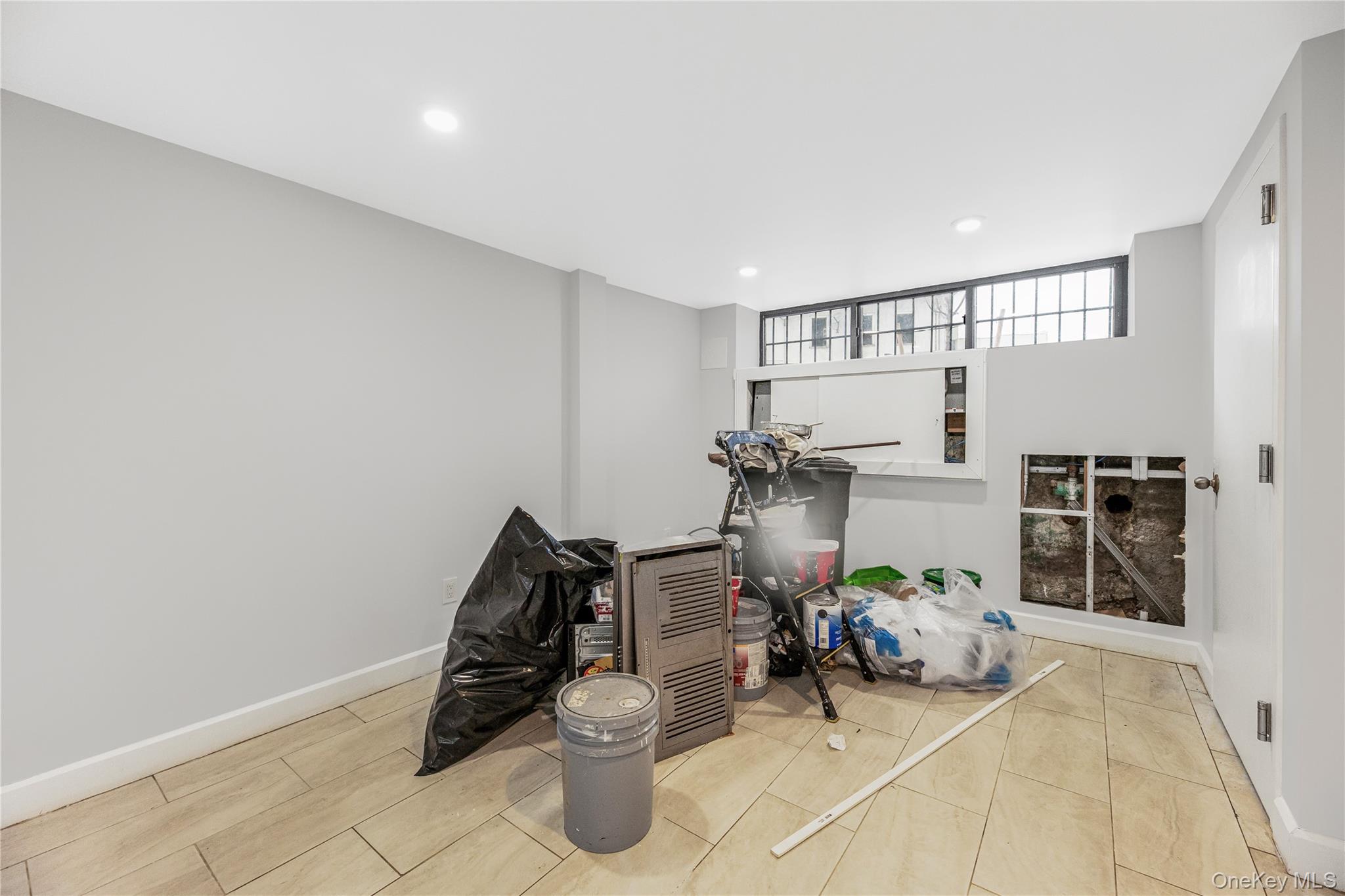 3067 Williamsbridge Road Bronx, NY 10467 - Photo 27 of 29 a view of a room with gym equipment