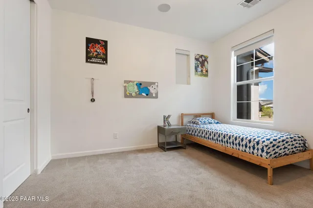 a room with furniture and a window