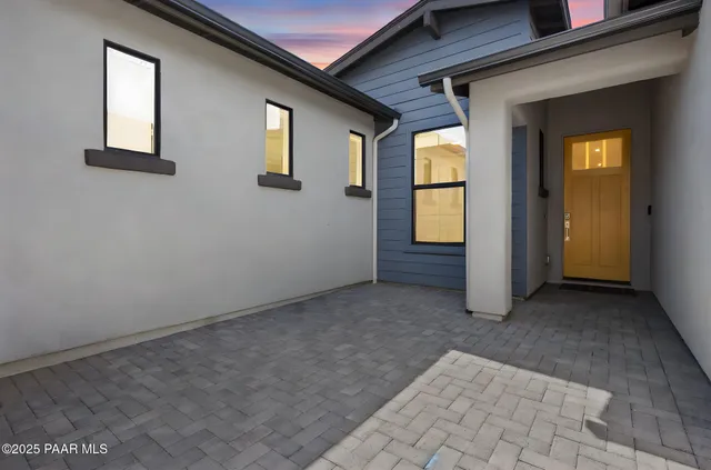 a view of a room with a fireplace