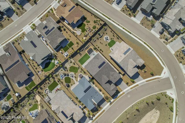 a large hall with furniture and a large window