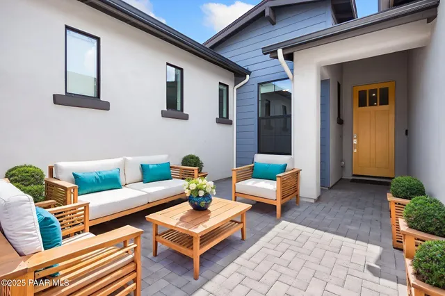 a building outdoor space with patio furniture