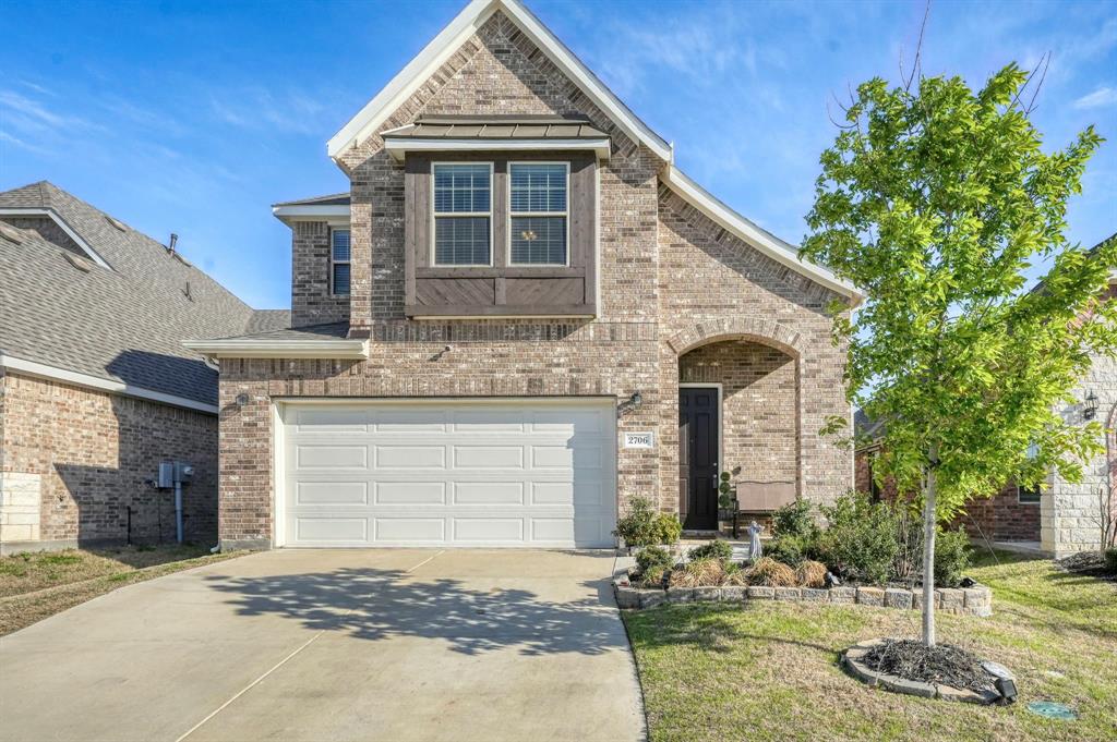 2706 Runnels Court Forney, TX 75126 - Photo 1 of 1 a front view of a house with garden