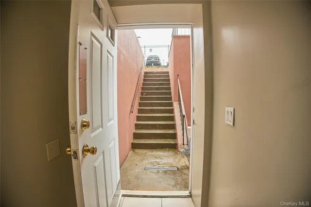 a view of hallway with stairs